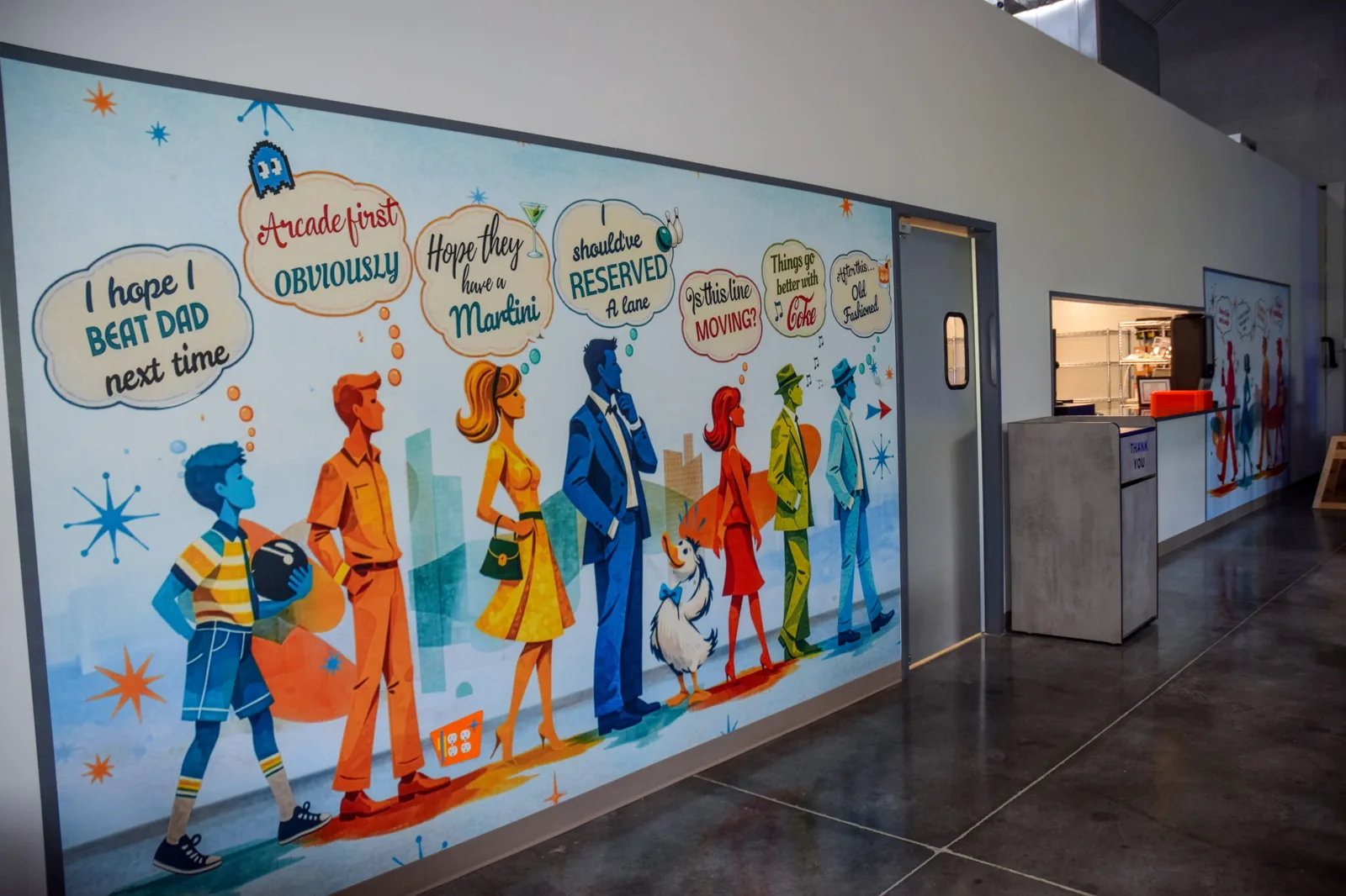 Funder Alley's entryway mural of retro figures waiting in line, with the front counter beyond